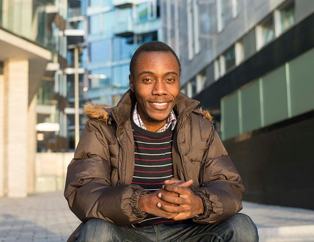 Smiling student in urban area